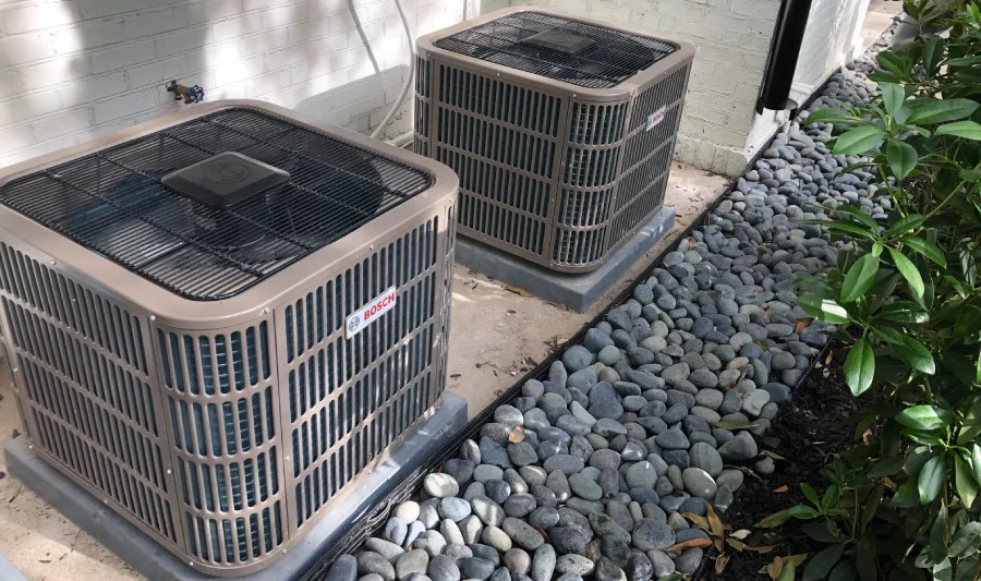 Dual Bosch AC units outside.